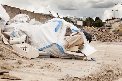 Step-by-step process of loft clearance being carried out